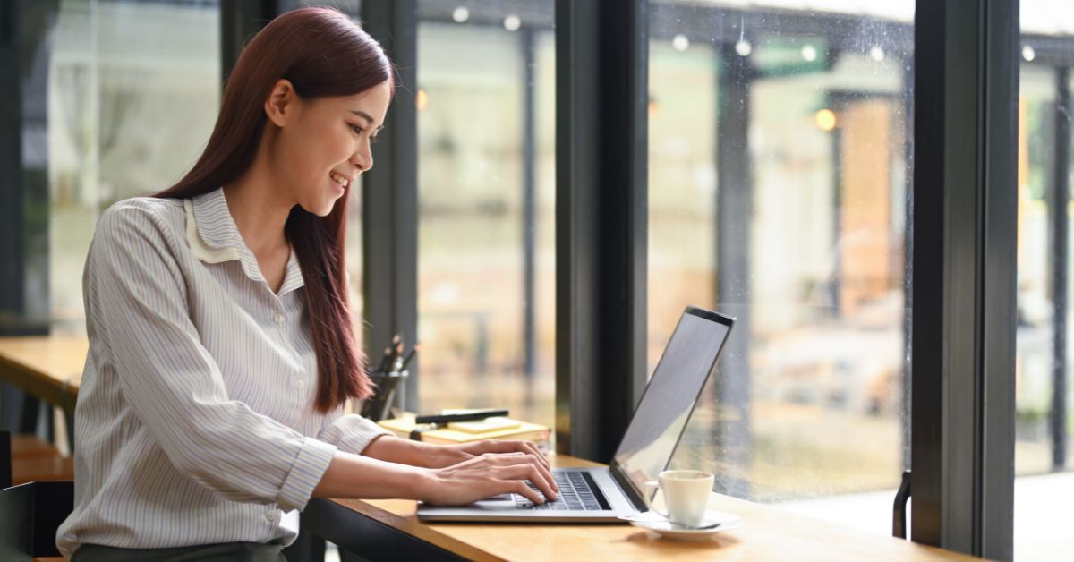a college student working on a cafe