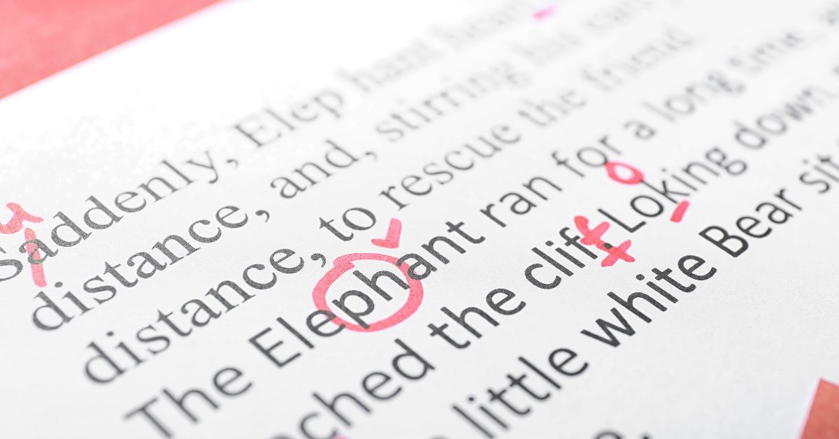an essay with corrections through red ink