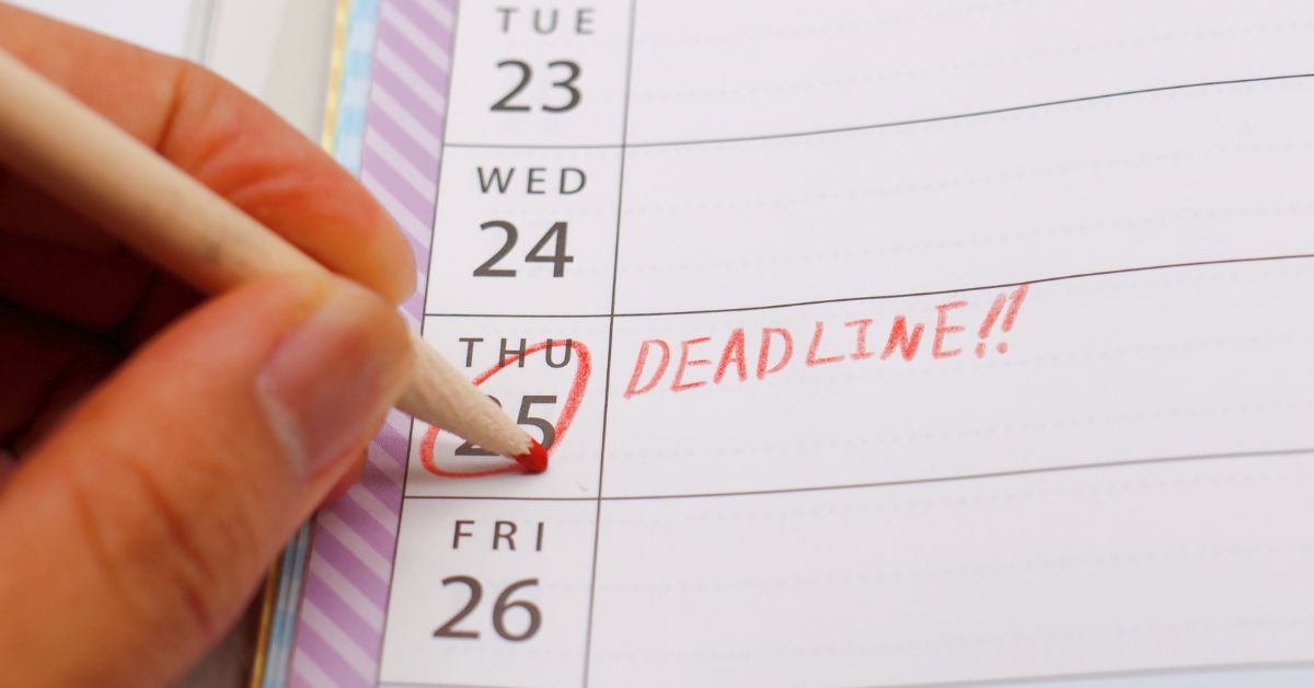 a calendar marked with deadline using a red pen