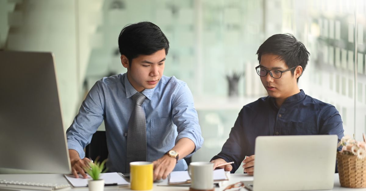 professionals doing research together in an office