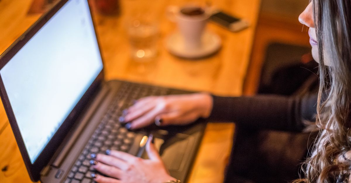 a girl typing an online essay