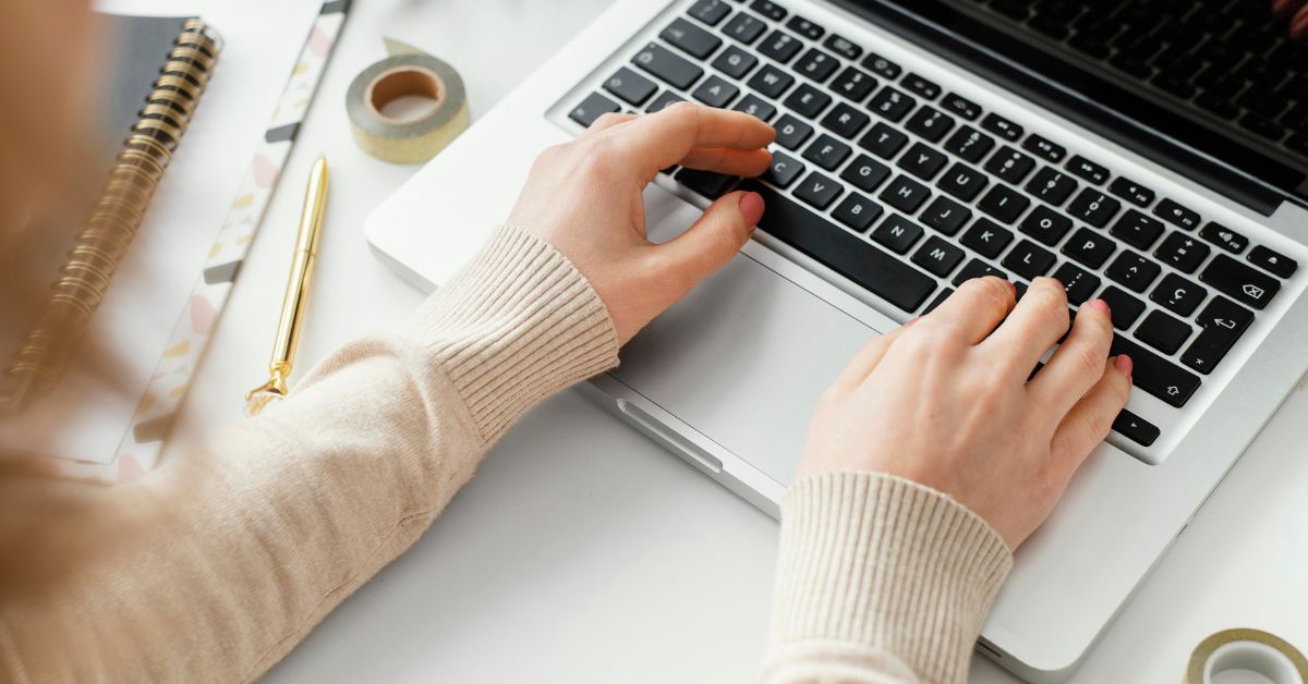 a woman working in a clean desk