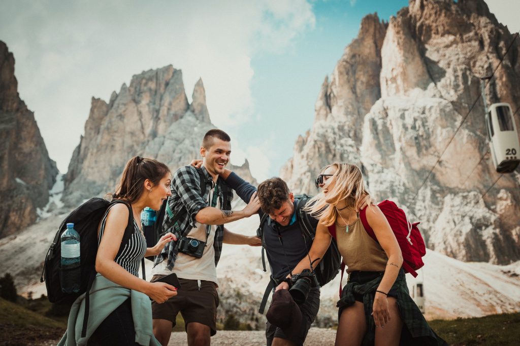 A group of friends out on a hike. Photo via Unsplash.