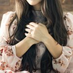 Girl with hands on her heart via Fa Barboza on Unsplash.com