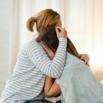 ALT TEXT: A mother comforting her crying daughter via pexels.com